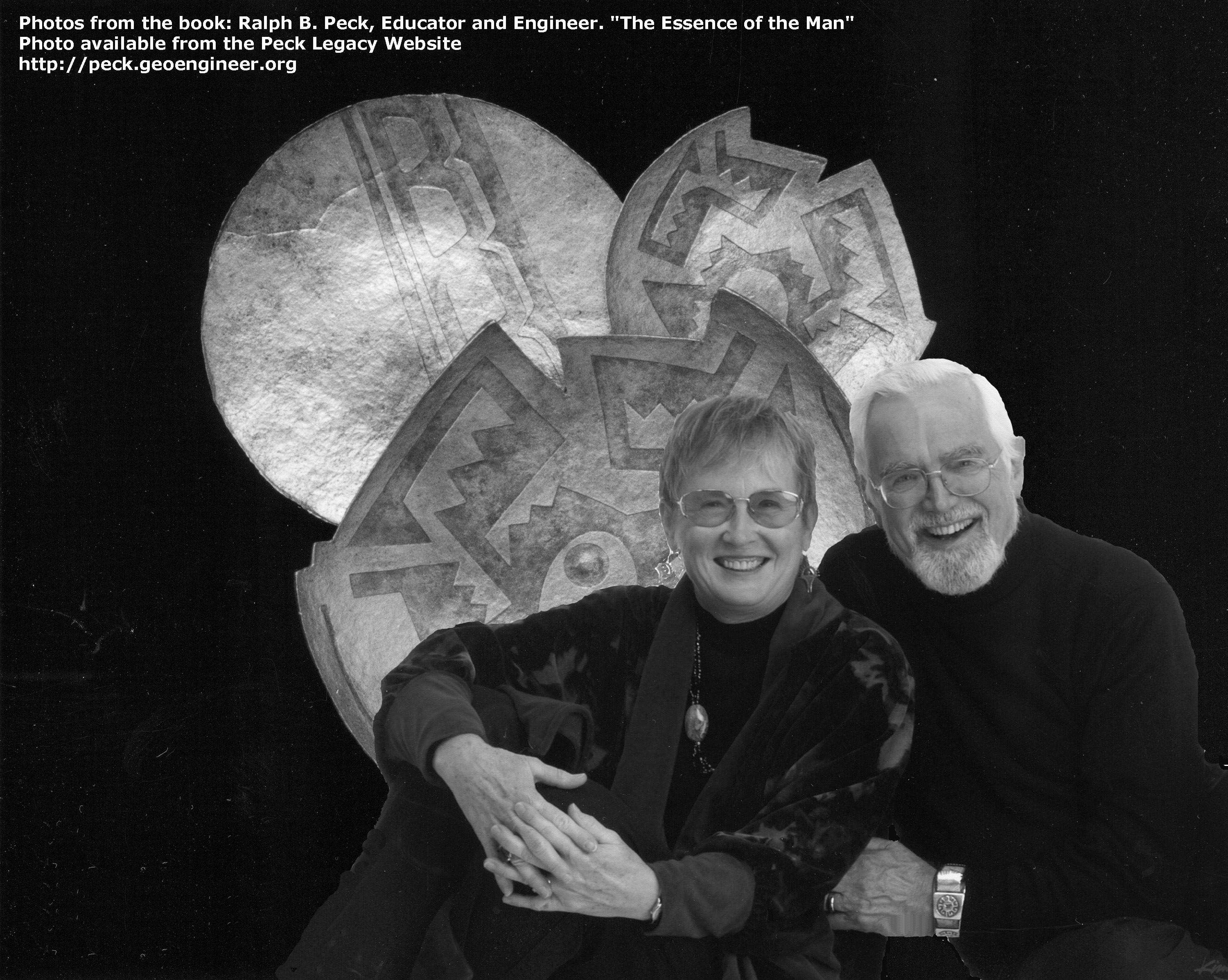 Photo#62: Nancy and Allen with Nancy's mixed-media art, 2004